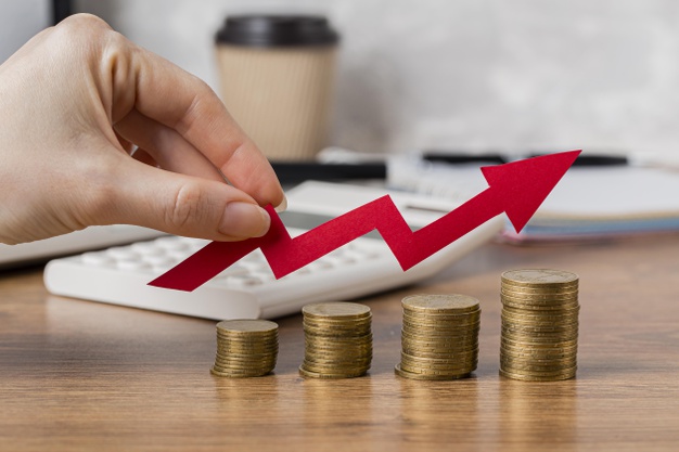 hand-holding-growth-arrow-with-coins_23-2148780591